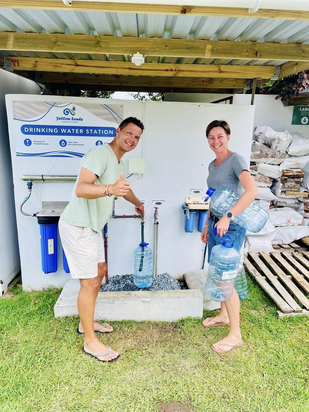 Guests filling containers at the Yellow Sands drinking water station